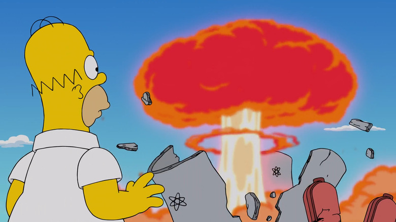 Homer causes a nuclear explosion at the power plant in The Simpsons