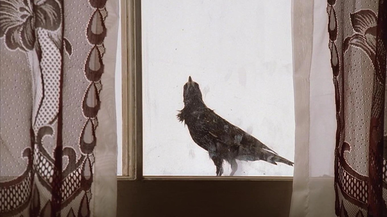 Crow looking through the window during Christopher's made man ceremony on The Sopranos