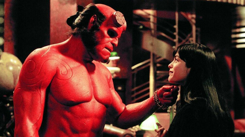 Hellboy caresses Liz Ron Perlman Selma Blair