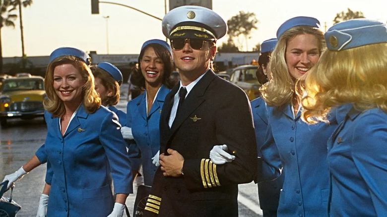 Leonardo DiCaprio with flight attendants in Catch Me If You Can