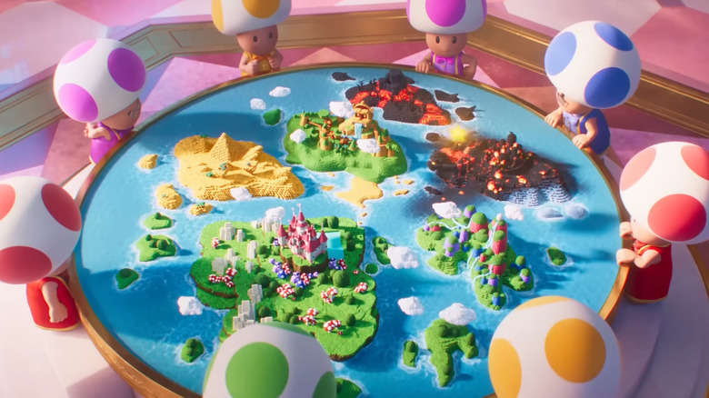 Toads around a map in The Super Mario Bros. Movie