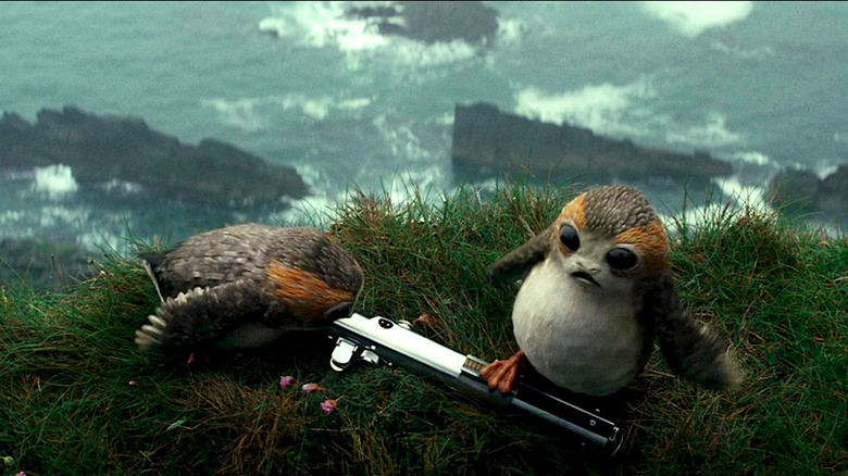 Porgs Inspect a Lightsaber