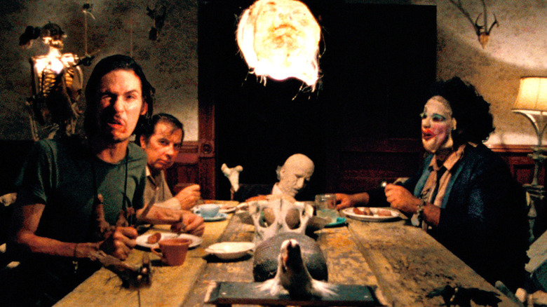 Edwin Neal, Jim Siedow, and Gunnar Hansen share a meal in The Texas Chain Saw Massacre
