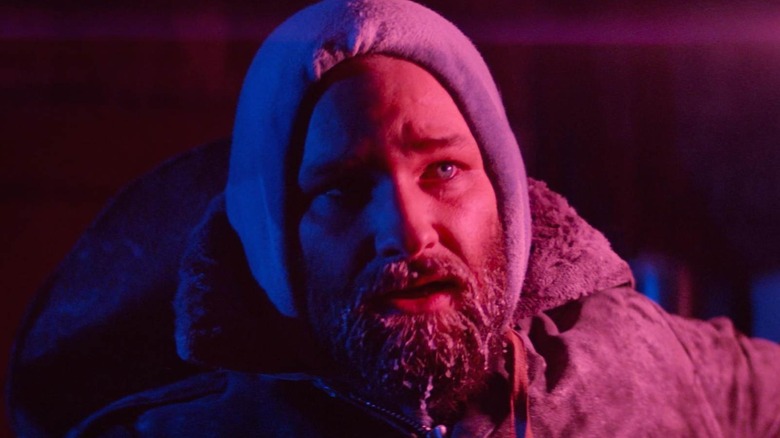 MacReady holding a flare in The Thing