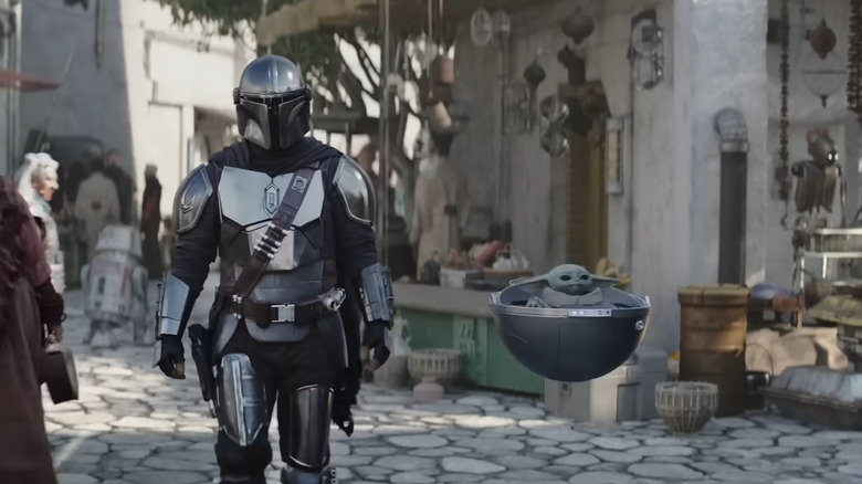 Din Djarin (Pedro Pascal) and Din Grogu in The Mandalorian