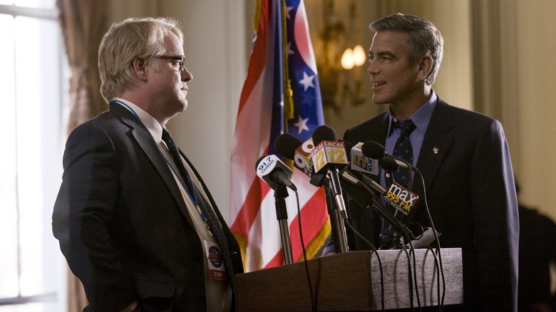 Philip Seymour Hoffman speaking with George Clooney