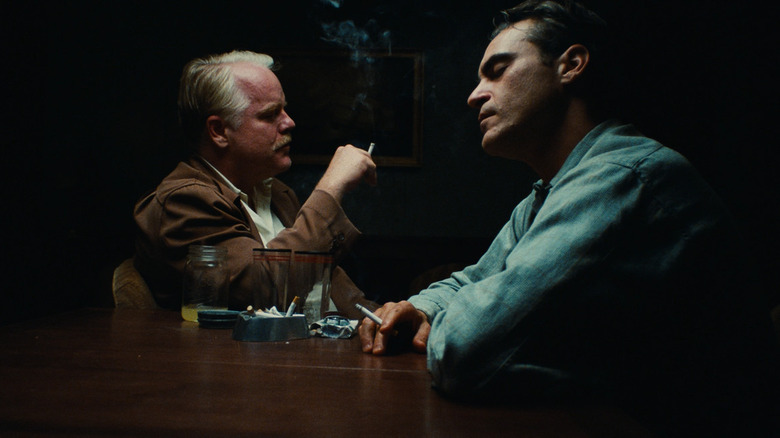 Philip Seymour Hoffman and Joaquin Phoenix smoking