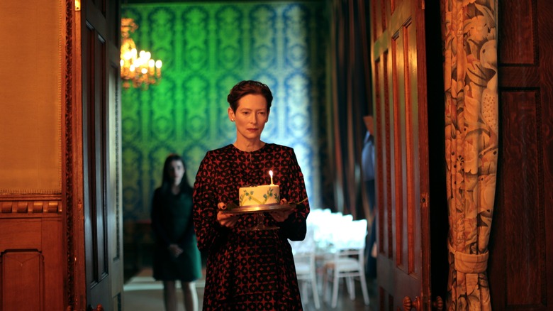 Swinton carrying cake