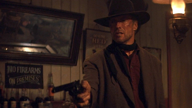 Clint Eastwood points gun in Unforgiven