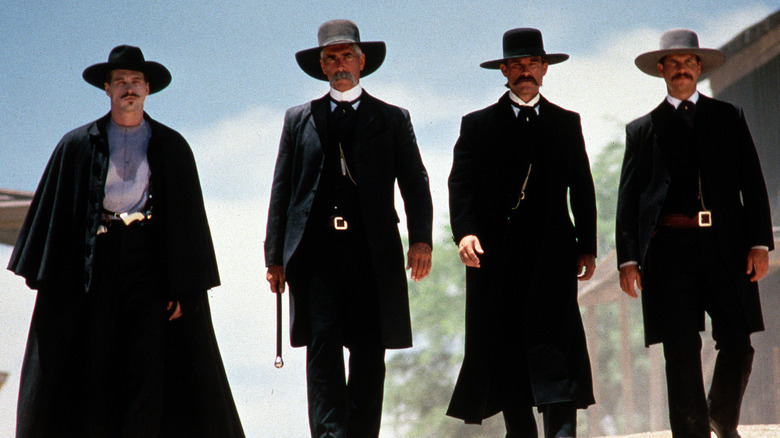 Four marshals walk through town in Tombstone