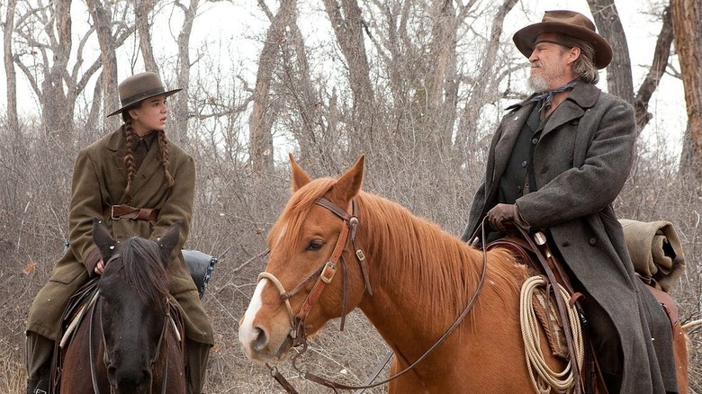 Mattie and Rooster on horseback in True Grit