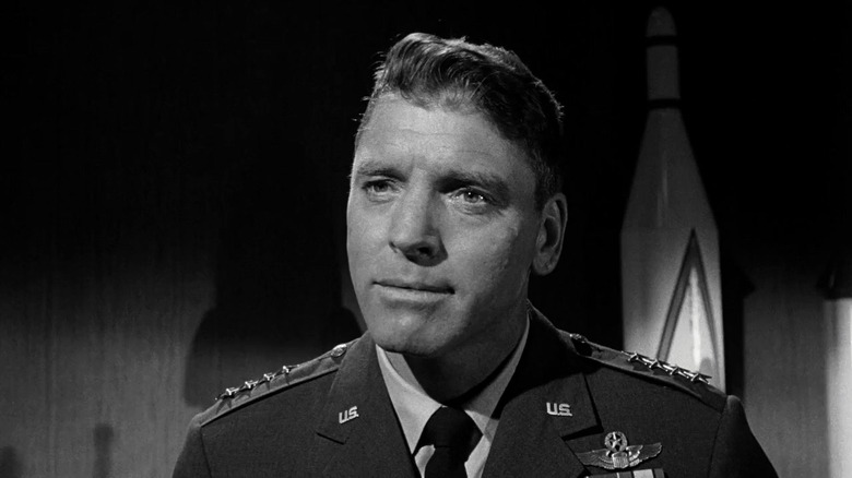 Burt Lancaster como James Mattoon Scott Sete Dias em Maio