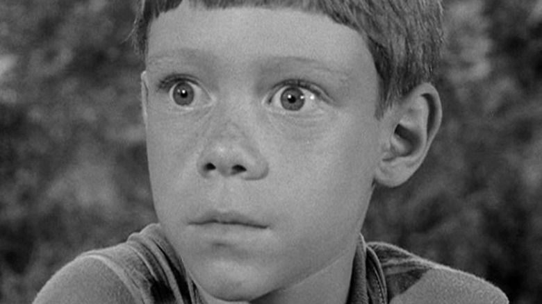 Anthony (Billy Mumy) widens his eyes in The Twilight Zone (1959)