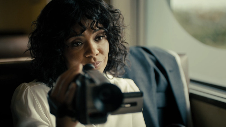 Nina (Sanaa Lathan) holds up a camcorder in The Twilight Zone (2019)