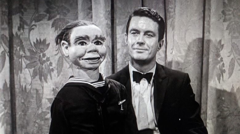 Jerry (Cliff Robertson) holds his ventriloquist dummy in The Twilight Zone (1959)