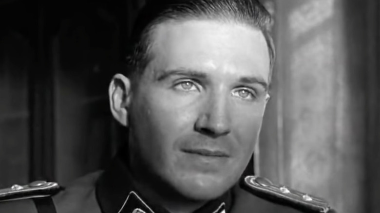 Ralph Fiennes in character wearing a Nazi uniform in Schindler's List