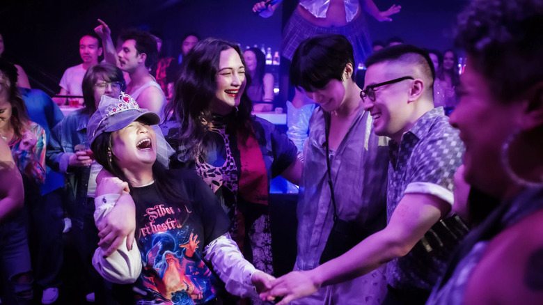 Angela, Lee, Min and Chris dance the night away in The Wedding Banquet