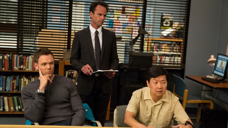 Walton Goggins as Mr. Stone conducting a polygraph test with Joel McHale as Jeff Winger and Ken Jeong as Ben Chang in Community season 5