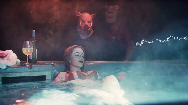 Pooh and Piglet stalk a woman in a hot tub in Winnie-the-Pooh: Blood and Honey