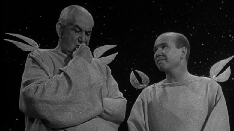 John Fielder and Howard Smith as angels with wings in the starry night sky in The Twilight Zone