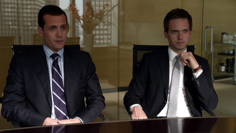 Mike and Harvey meeting up with a client in Season 1 of Suits