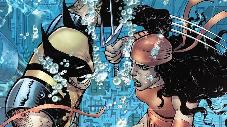 Logan and Elektra fight underwater in Wolverine comics