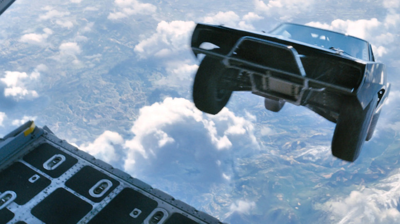 A car dropping out of a plane in Furious 7