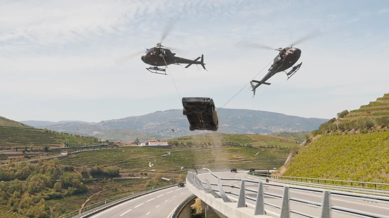 The helicopter-suspended car stunt in Fast X