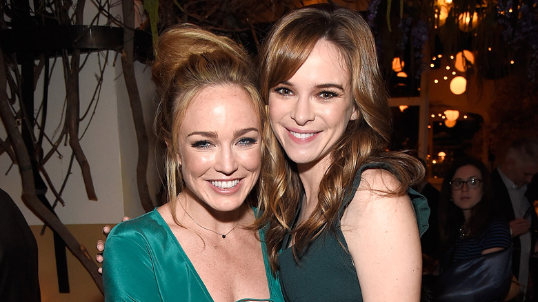 Caity Lotz and Danielle Panabaker smiling