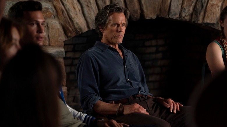 Kevin Bacon seated