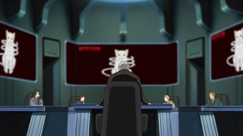 The Supreme Council meets as a chairman talks to a cat on a screen in Planetes