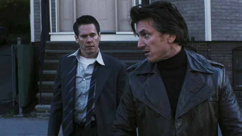 Jimmy and Sean talk outside on the streets of Boston in Mystic River