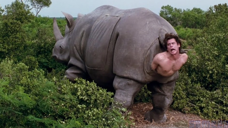 Jim Carrey emerges from a mechanical rhino in Ace Ventura: When Nature Calls