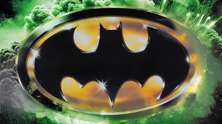 The Bat-symbol surrounded by green on the cover of Batman Revolution