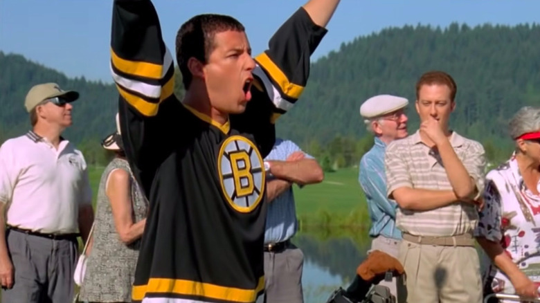 Adam Sandler strikes a victory pose as the titular Happy Gilmore