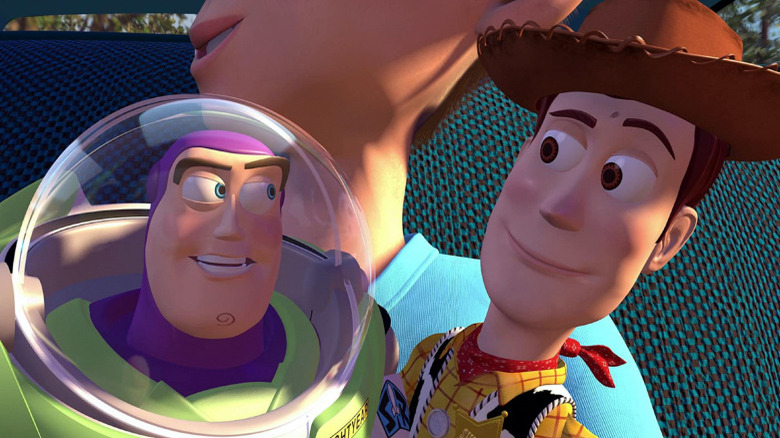 Buzz and Woody with Andy in Toy Story