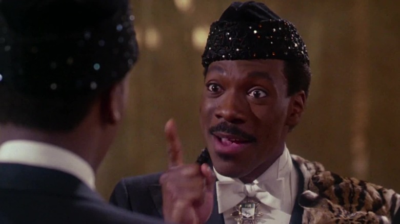 Eddie Murphy wagging finger as Prince Akeem in Coming to America