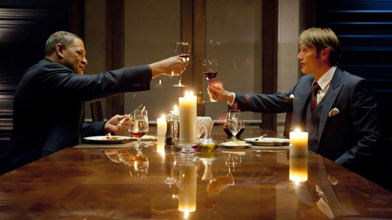 Hannibal (Mikkelsen) dines with FBI agent Jack Crawford (Laurence Fishburne) 