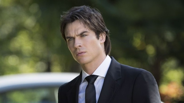 The Vampire Diaries Damon stares inquisitively