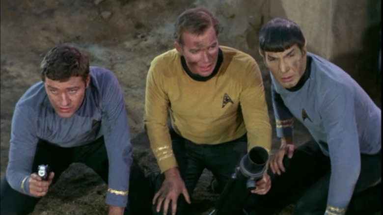 Star Trek Kirk, Spock, and crewman prepare a mortar