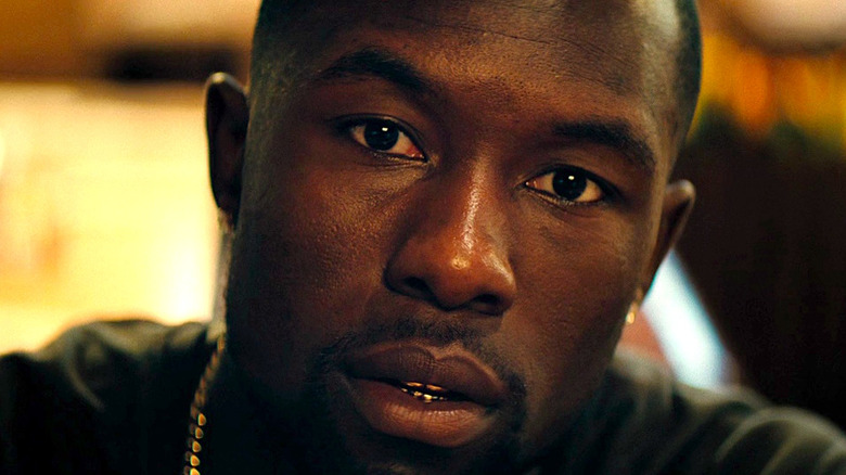 Trevante Rhodes looks into the camera in Moonlight