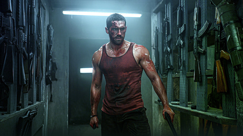 Scott Adkins covered in blood