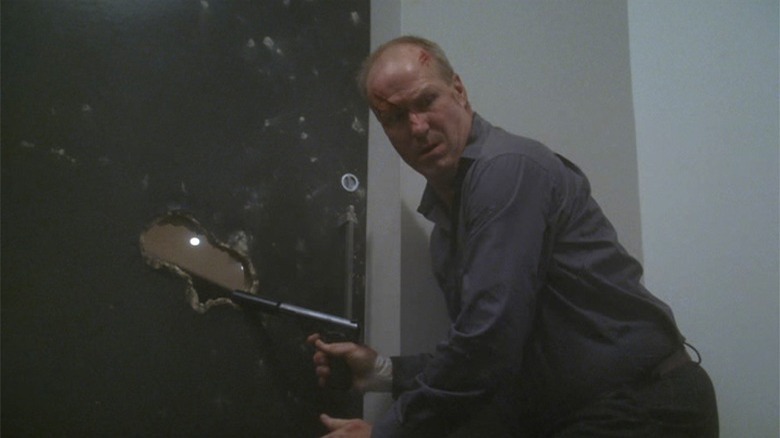 William Hurt pointing gun through door Nightmares and Dreamscapes: From the Stories of Stephen King