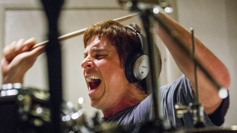 Christian Bale playing the drums in The Big Short