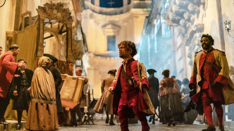 Peter Dinklage striking a pose in Cyrano