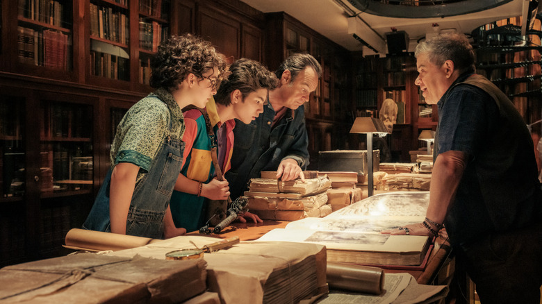 The Ghostbusters doing research at the library in Ghostbusters: Frozen Empire