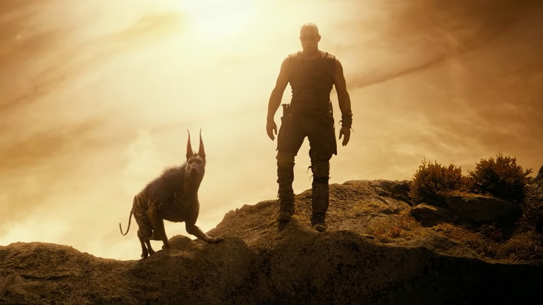 Vin Diesel and friend in Riddick