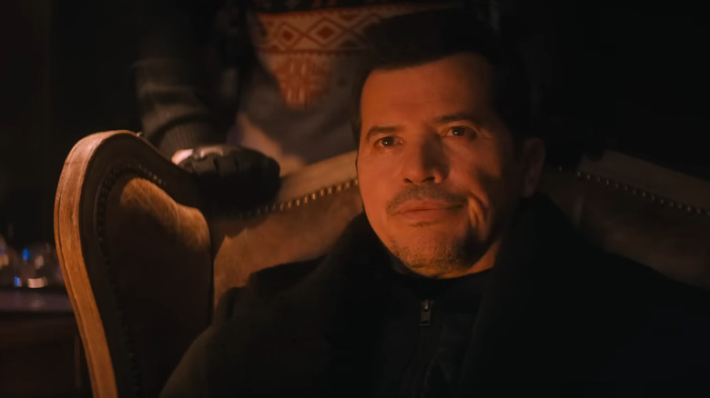 John Leguizamo as Scrooge in Violent Night