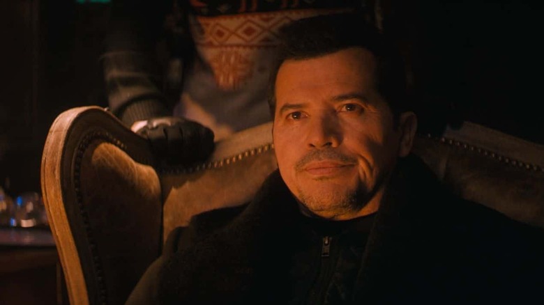 Violent Night leguizamo in chair