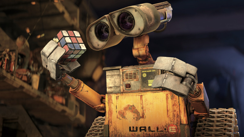 WALL-E playing with a rubik's cube